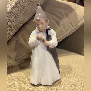 Royal Copenhagen figure boy with umbrella